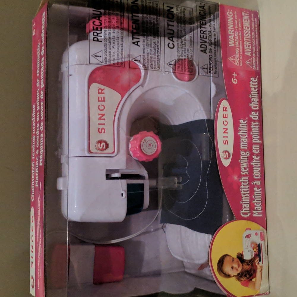 Singer sewing machine for young girl.